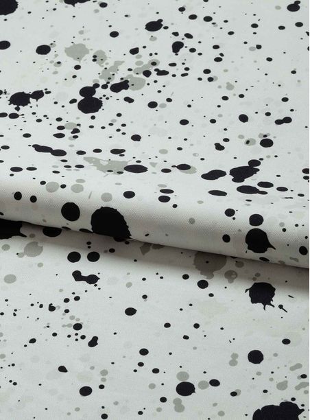 Tecido estampado pingos preto e branco
