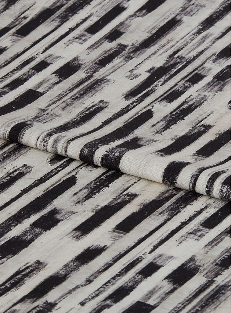 Tecido-estampado-fragmentos-off-white-e-preto